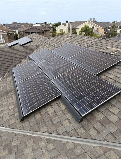 Dusty, grimy solar panels before cleaning